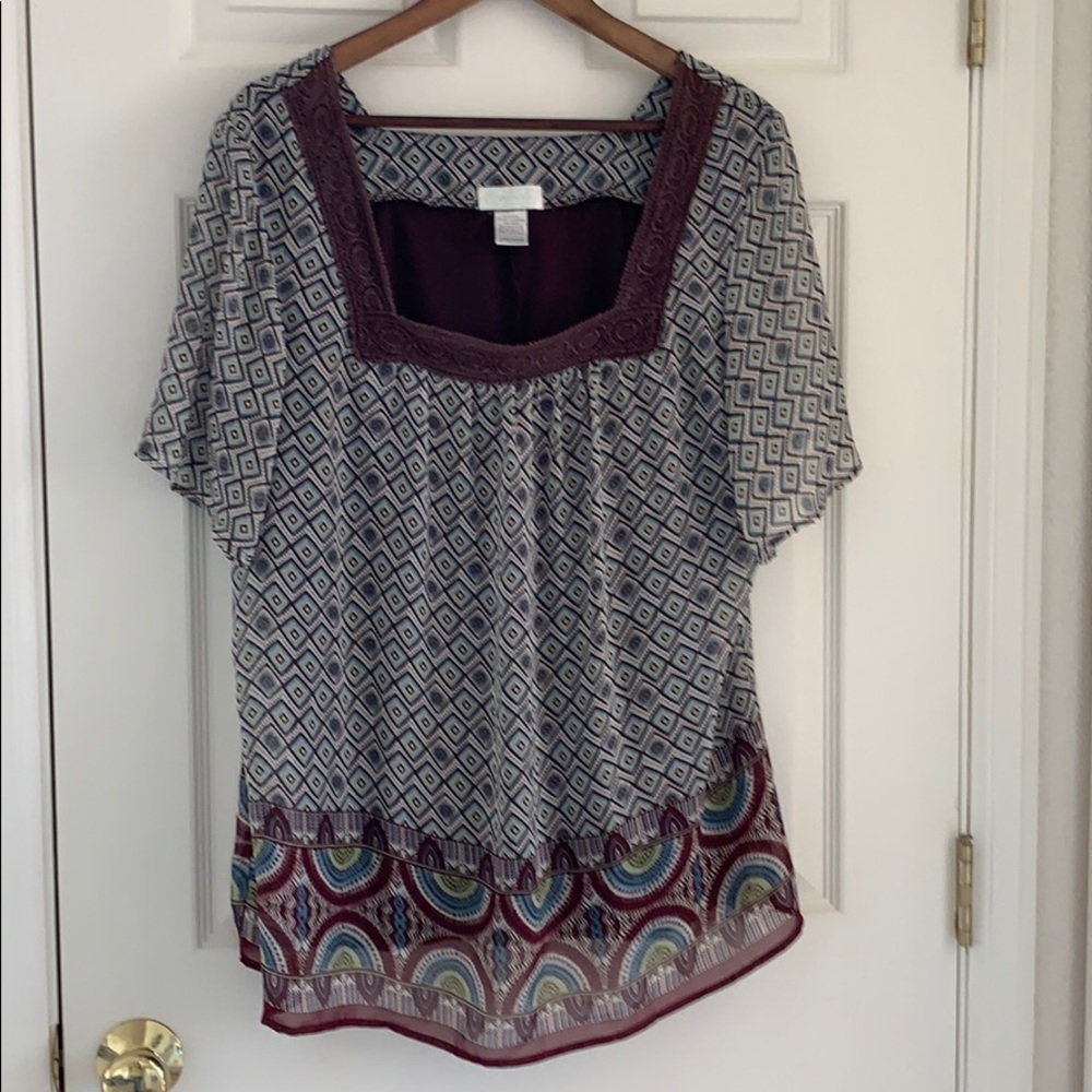 Maurice’s multi-colored tunic